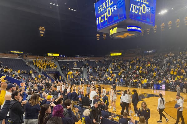 Michigan celebrates their regular-season-closing win vs. Purdue.